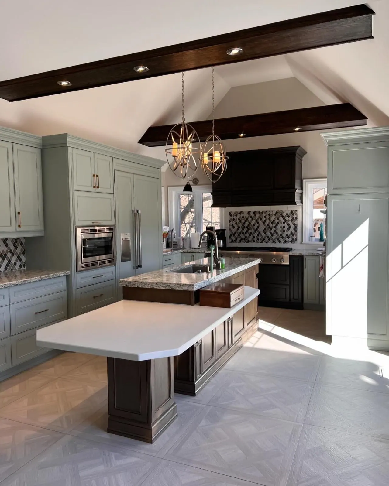 Kitchen with sage-green painted cabinets