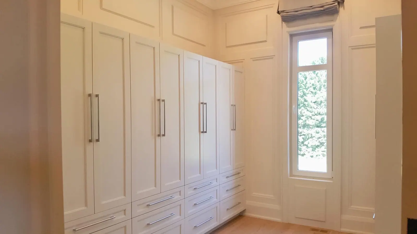 Floor-to-ceiling painted wardrobe doors